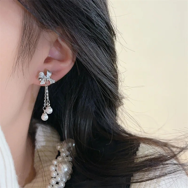 Butterfly Knot Womens Tassel Earrings Selling Unique Lightweight Fashion Versatile Pearl Pendant Earrings Jewelry 250409
