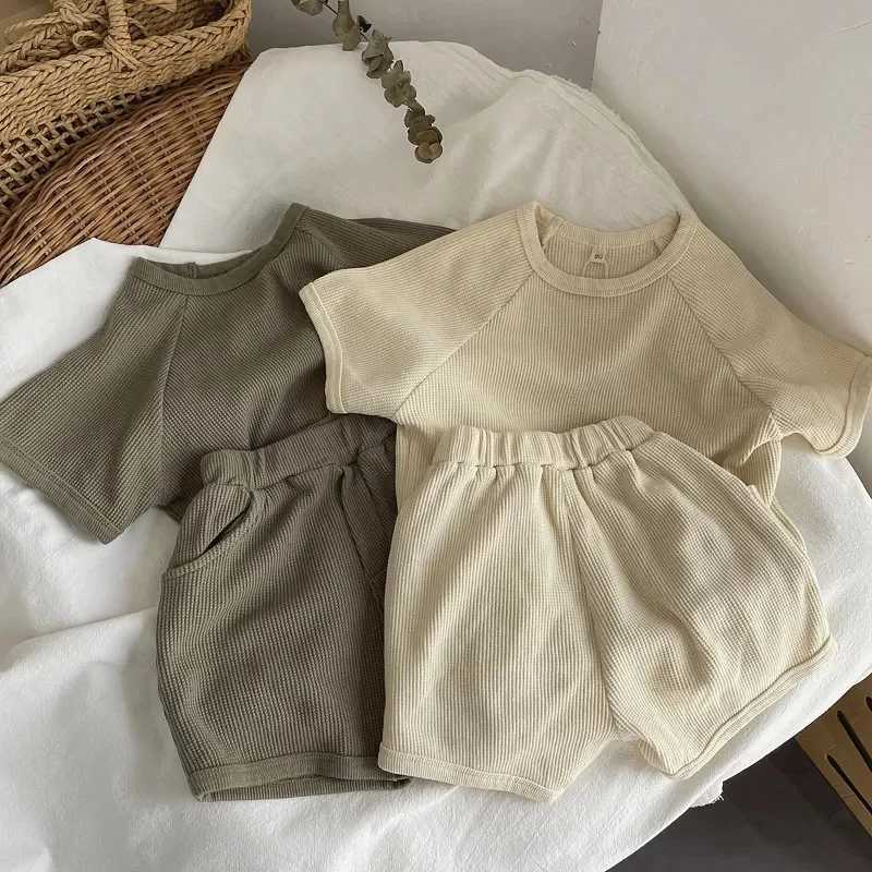 Childrens short sleeved set summer boy and girl waffle set childrens T-shirt+shorts 2-piece baby casual simple solid color set 1-6YXJ250410