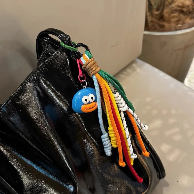 Cute Sausage Mouth Keychain With Stripe Ropes Bag Charm Decoration Hanging Pendant Accessories Colorful Tassel Ropes Phone Strap 251110