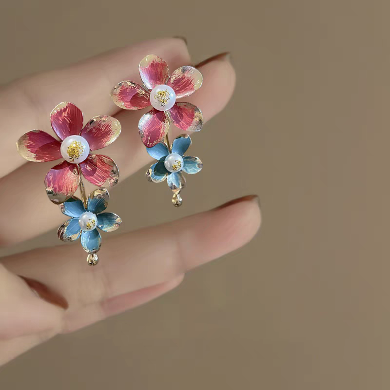 Women's are exaggerated to create floral earrings
