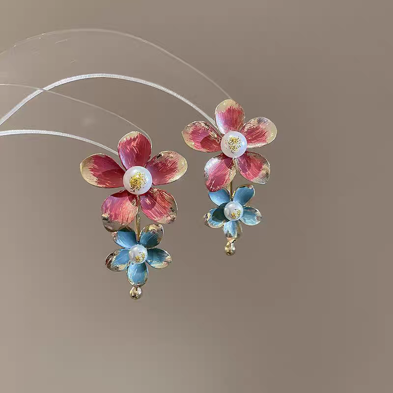 Women's are exaggerated to create floral earrings