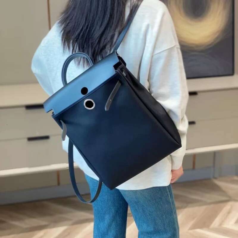 Backpack 2025 new fashion handbag waterproof canvas leisure large capacity shoulder bag high-grade leather backpack