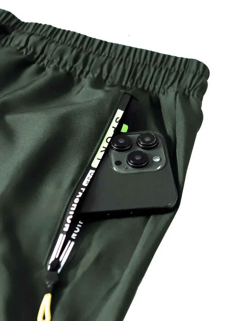 1pc Men Lightweight Cargo Pants with Drawstring Elastic Waist Multiple Zipper Pockets Large Side Pockets Breathable Regular Fit 251110