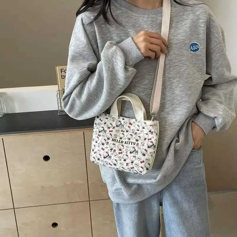 Sanrio Girl Cartoon Canvas Handbag Hello Kitty Student Sweet Kawaii Shoulder Bag Versatile Portable Backpack Travel Handbag New H251111