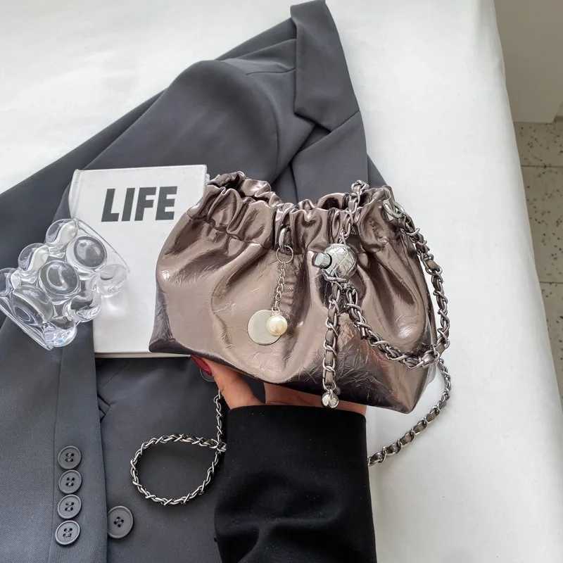 High end niche versatile diagonal chain bag womens drawstring shoulder bag bucket bag cloud bagT251110