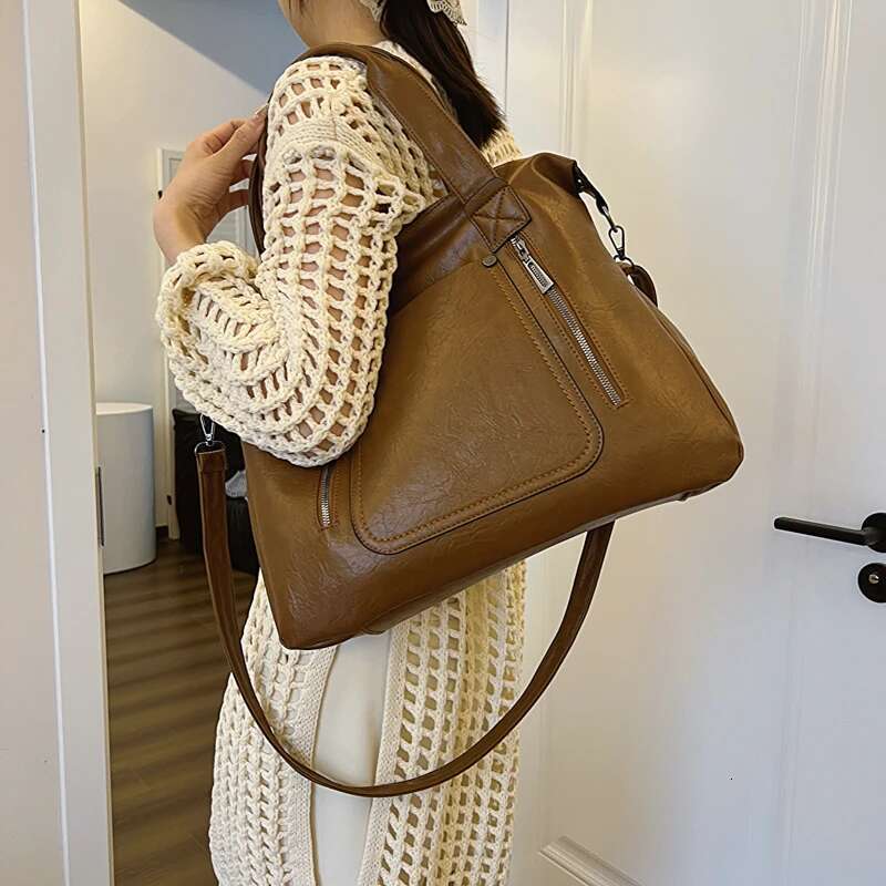 2025 new solid color business oversized shoulder bag designed for both men and women, sturdy, durable, waterproof and dustproof4