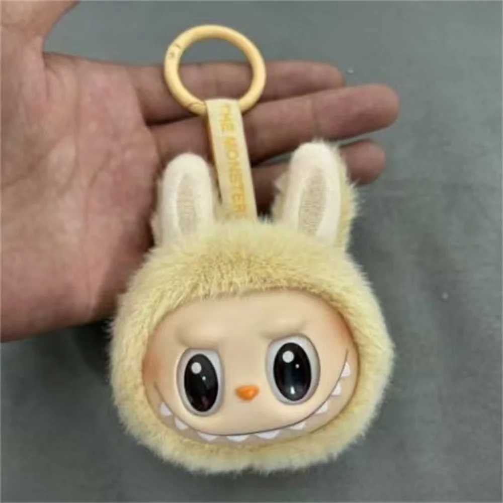 Sitting on the outside of Labubu doll keychain implanted with Fluff Pvc toy phone decoration bag charming car keychain Christmas gift W250411