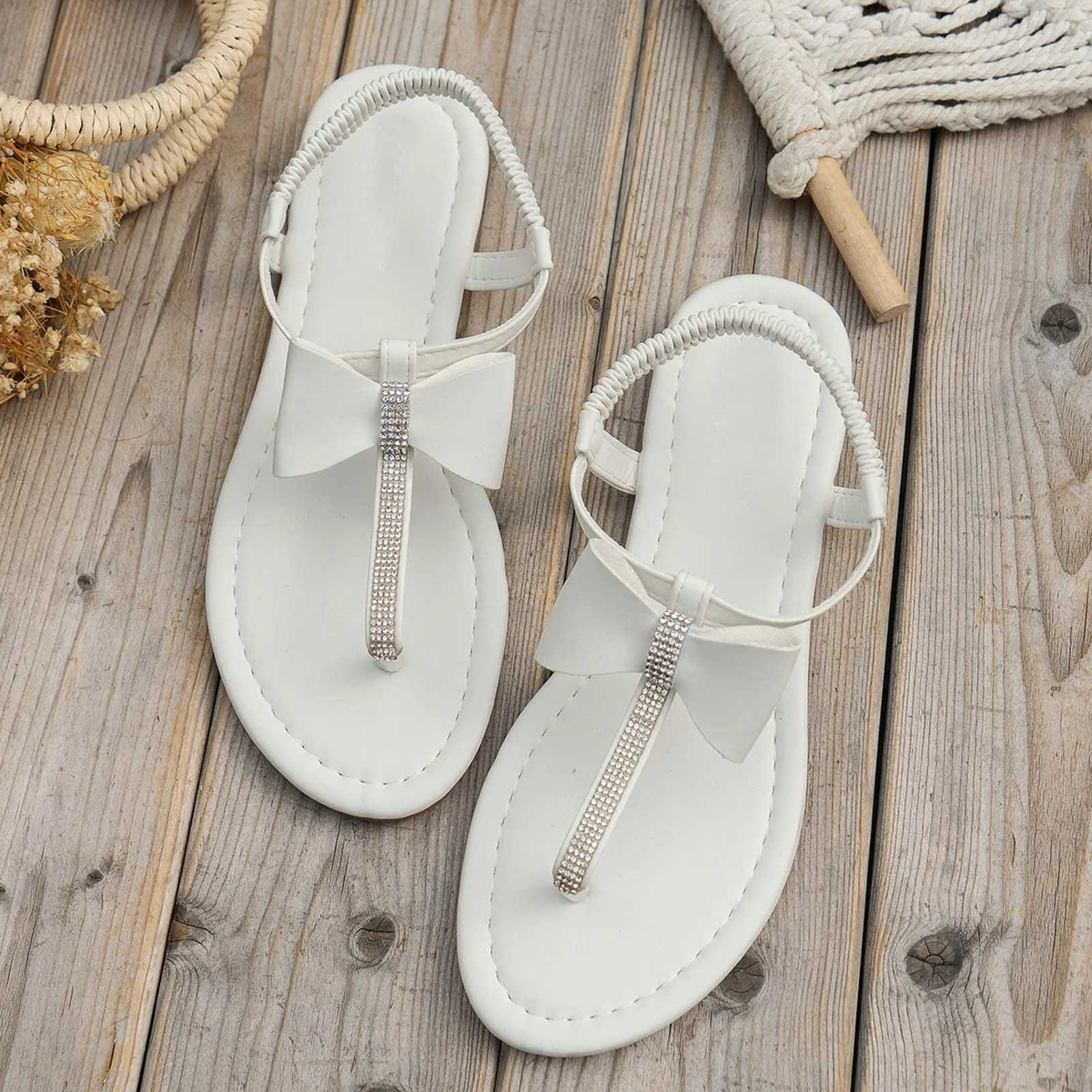 Fi flat sandals shiny bow Rhine summer beach womens sandals elastic band elegant clip toe sandalsXJ250410