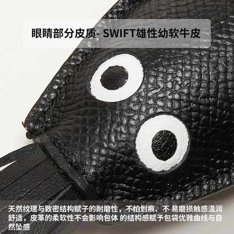 Cowhide handmade bag charm leather squid charm key ring tassel design pendant car keychain bag accessoriesW251105