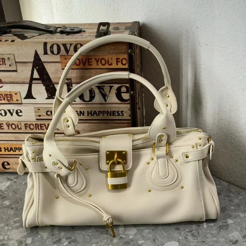 Womens Bag Rivet Retro Street Motorcycle Original Niche n shoulder Crossbody Female Tote Handbag 251103