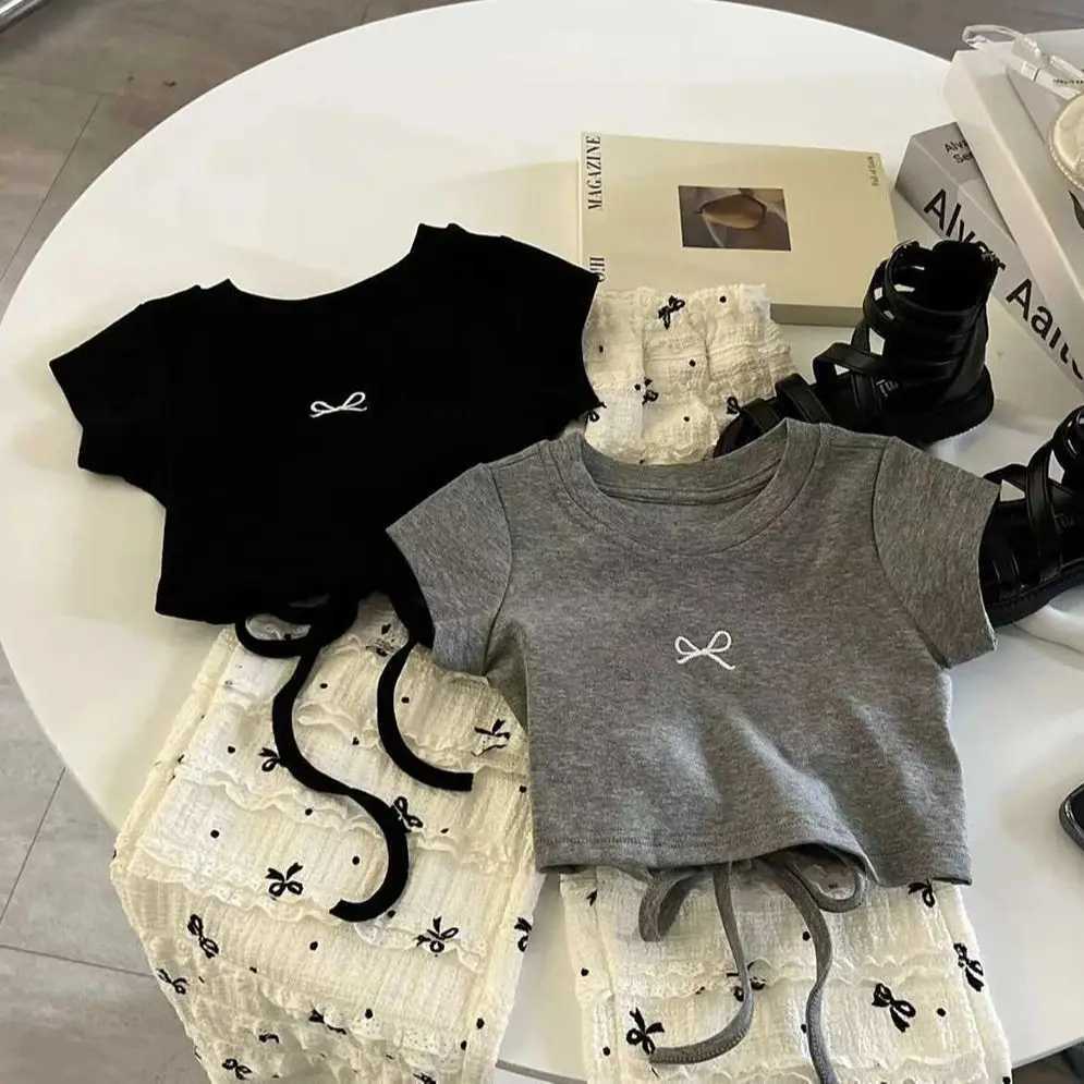 Childrens girl bow T-shirt+loose pants 2-piece summer childrens clothing set short sleeved backless T-shirt bow tie pants girl setXJ250410