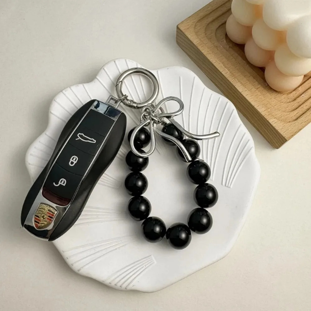 Exquisite Beautiful Beads Bowknot Keychains Phone Accessories Imitation Pearl Bag Pendant Accessories Metal Bead Key Chains 251110