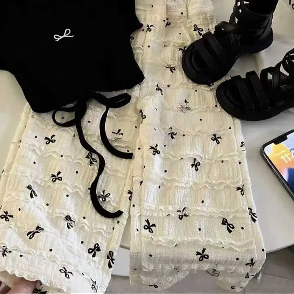 Childrens girl bow T-shirt+loose pants 2-piece summer childrens clothing set short sleeved backless T-shirt bow tie pants girl setXJ250410