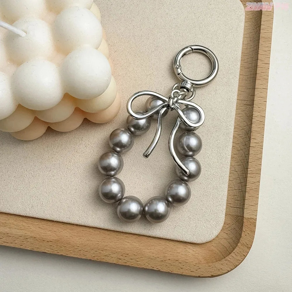 Exquisite Beautiful Beads Bowknot Keychains Phone Accessories Imitation Pearl Bag Pendant Accessories Metal Bead Key Chains 251110