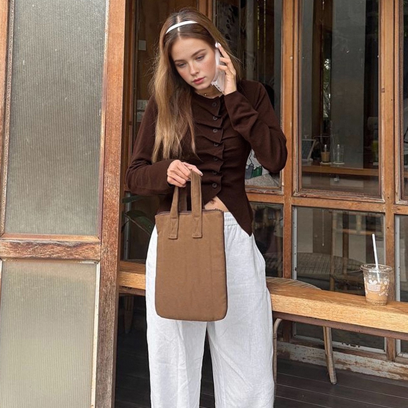 Solid color women's vintage fashionable sweater, with an elegant front opening, front buttons, long sleeves and a round neck---TVL031