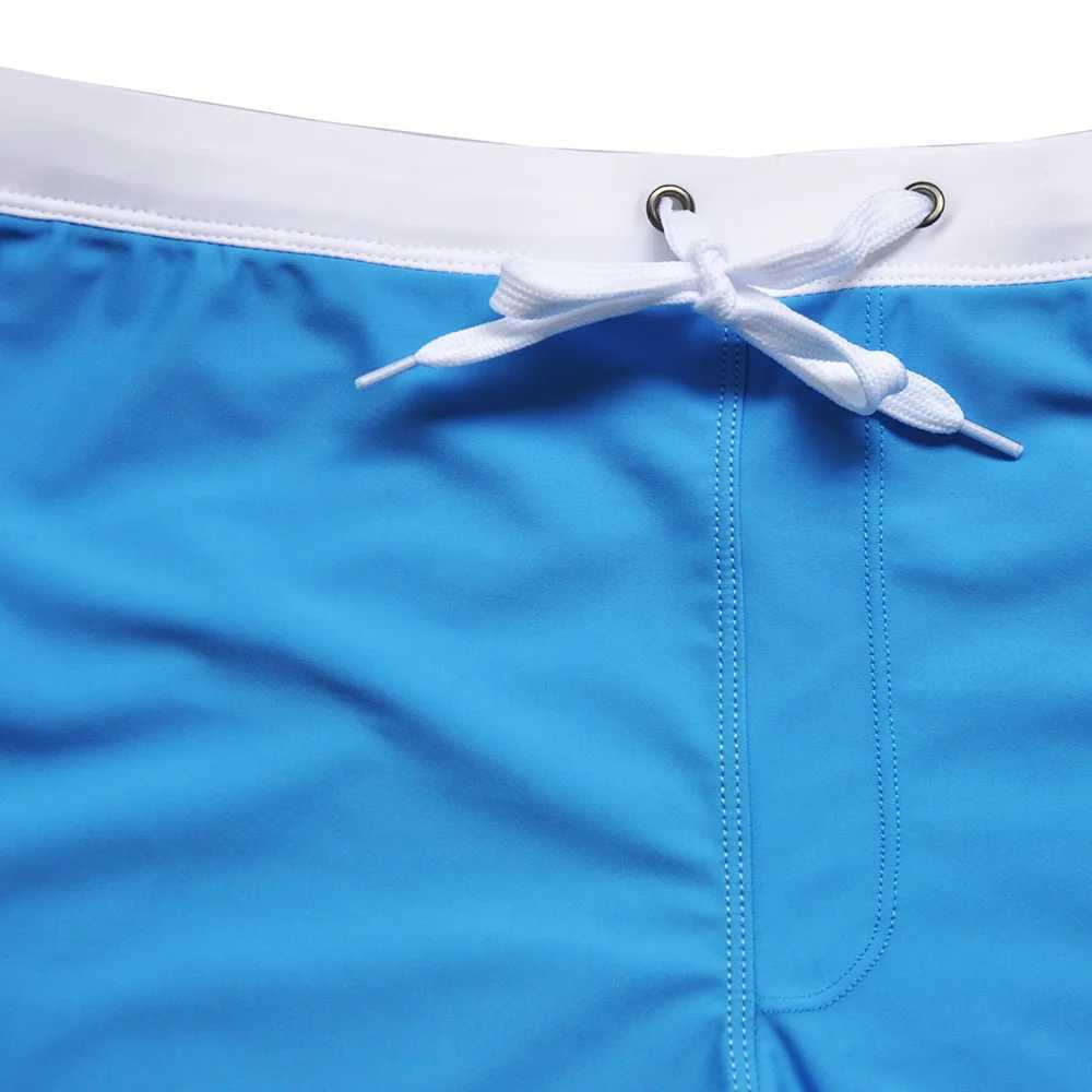 Mens swimsuit low waist surfing dry swimsuit sexy and personalized swimsuit mens pocket swimsuit beach swimsuit mens swimsuitW250410