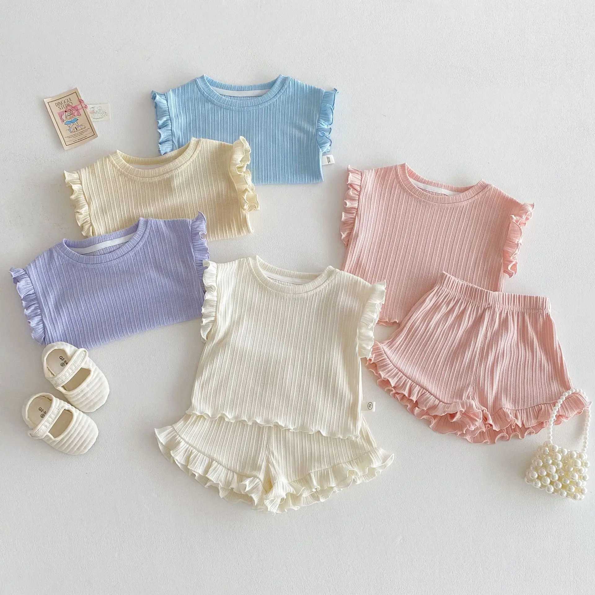 Milancel Girls sleeveless T-shirt set childrens solid color pleated vest shorts 2PCS summer set baby clothing childrens clothingXJ250410