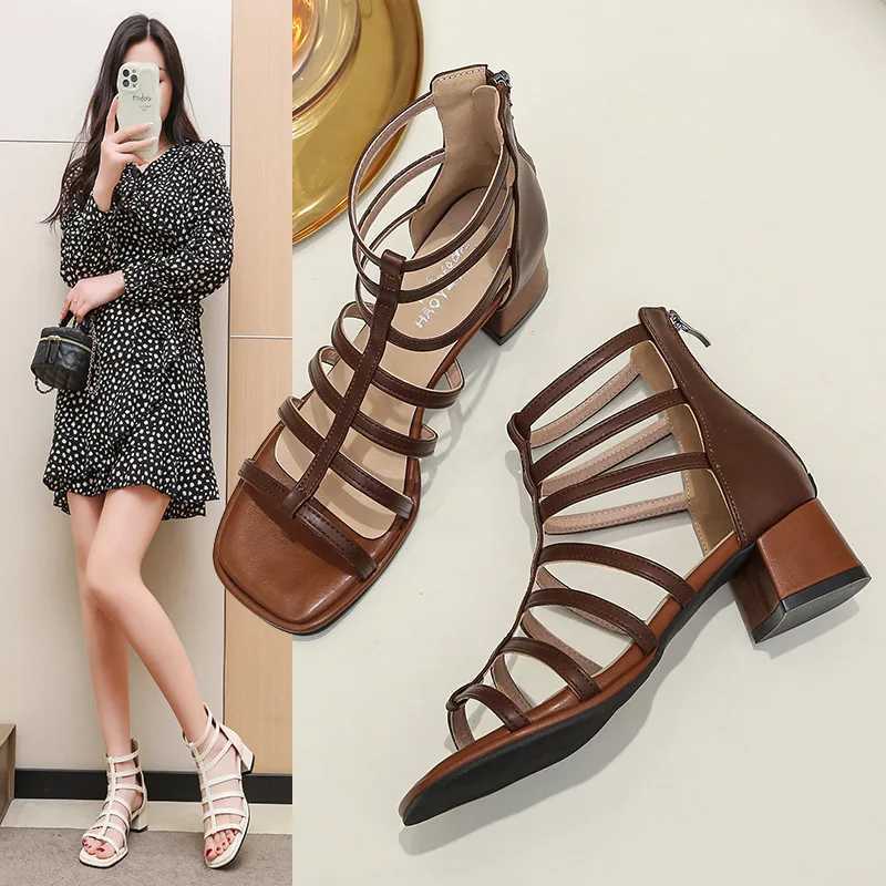 Womens Summer New High Heel Platform Boots Womens Fi Square Toe Hollow Sandals Solid Color Sexy Party Dress SandalsXJ250410