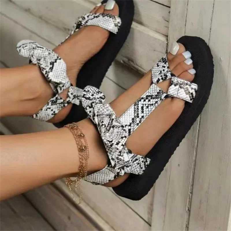 New summer womens sandals in flat casual lace bow shoes suitable for womens Fi 2023 outdoor leopard beach MUJIXJ250410