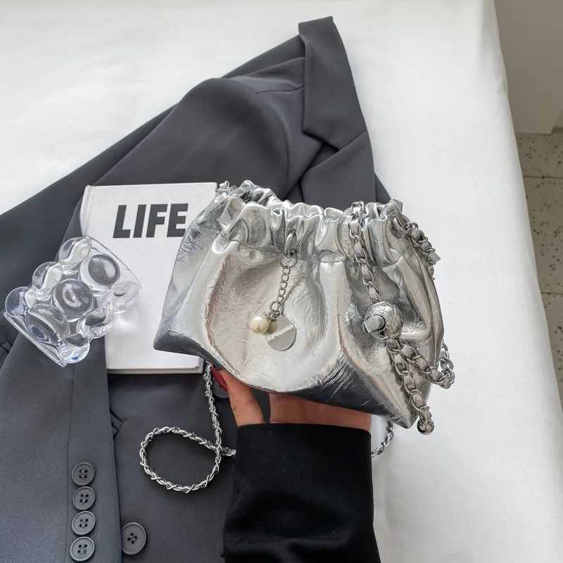 High end niche versatile diagonal chain bag womens drawstring shoulder bag bucket bag cloud bagT251110