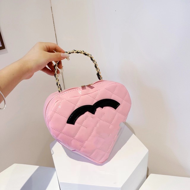 New black and white sized love bag fashionable crossbody bag designer bag smooth crossbody backpack mobile phone bag wallet