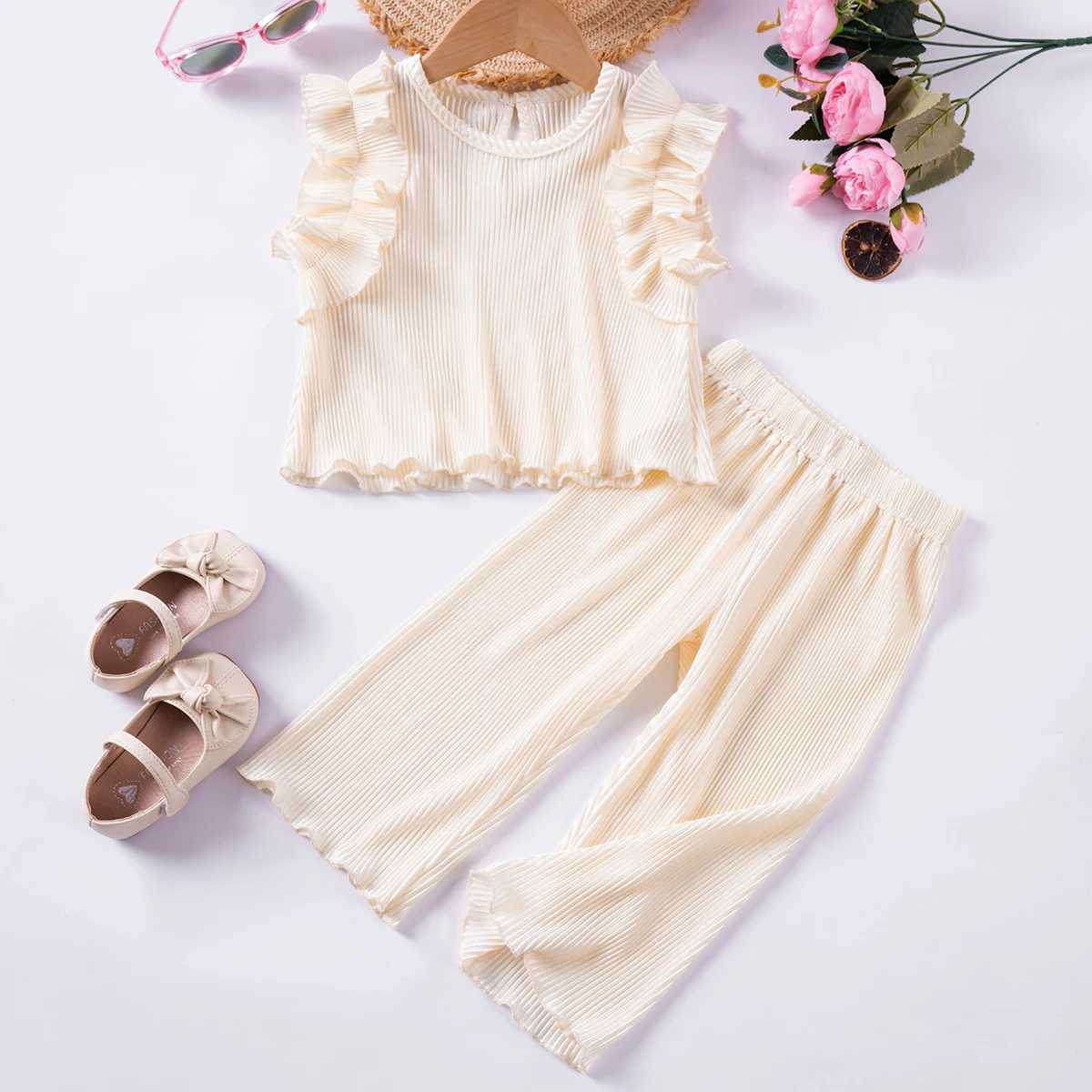 Girls 2-piece summer solid color short sleeved top with black fungus edge and sparkling pants set casual holiday summer setXJ250410