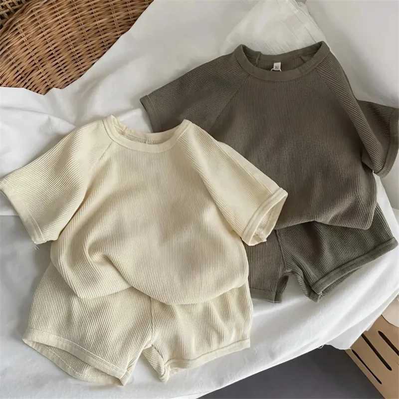 Childrens short sleeved set summer boy and girl waffle set childrens T-shirt+shorts 2-piece baby casual simple solid color set 1-6YXJ250410