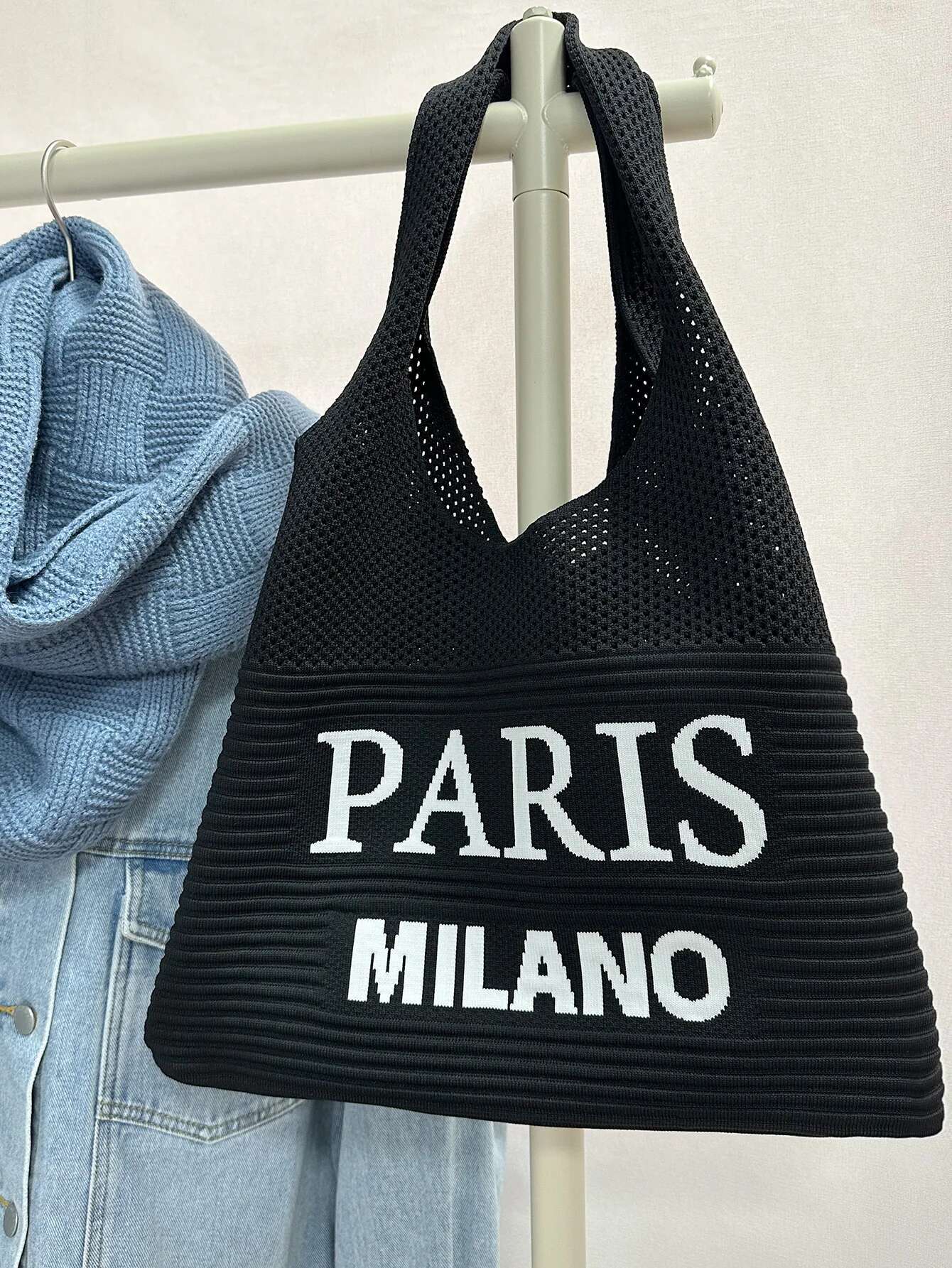 2025 new autumn and winter fashion designer women's one shoulder retro letter cut knitted handbag crochet fabric shopping2