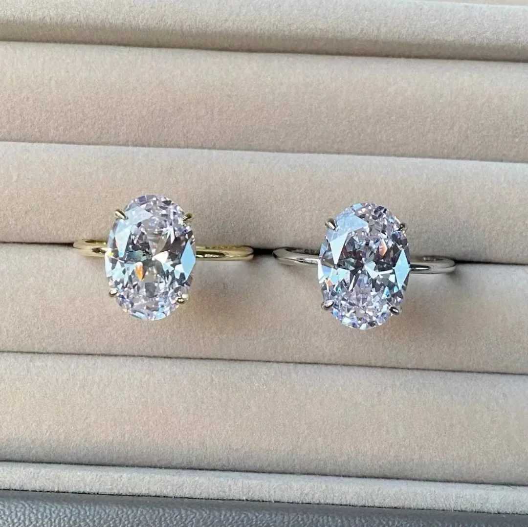 2024 Fashionable White Oval Pigeon Egg Zircon Plated Gold and Silver Female Engagement RingXJ250412