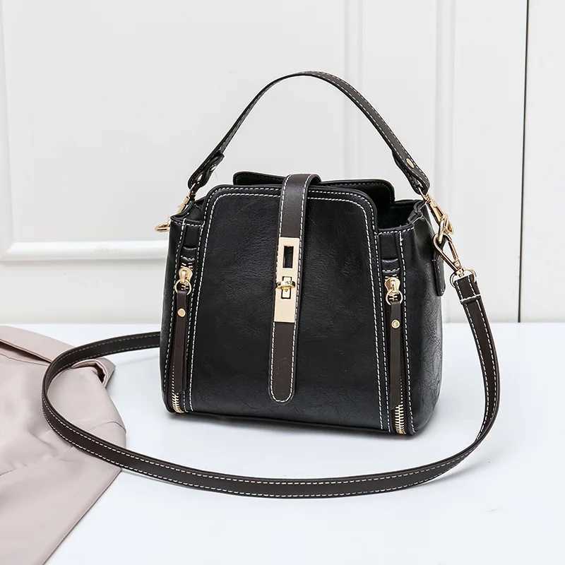 New PU leather bucket shoulder bag womens solid color ten font small handbag zipper party wallet messenger bagXJ250412