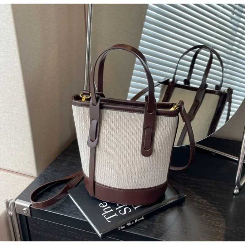 2025 Fi Versatile PU canvas bucket shoulder and cross body bag simple casual womens luxury handbagXJ250412