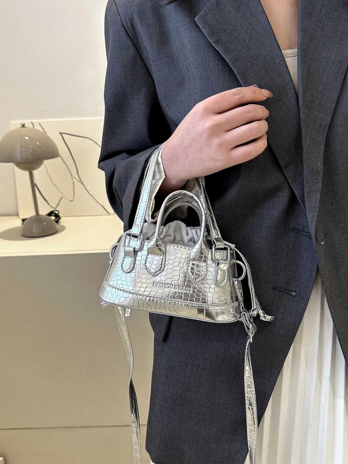Lightweight Business and Leisure Mini Metal Odell Embossed Bucket Bag Drstring Design Novel Teenage Girl BagXJ250412