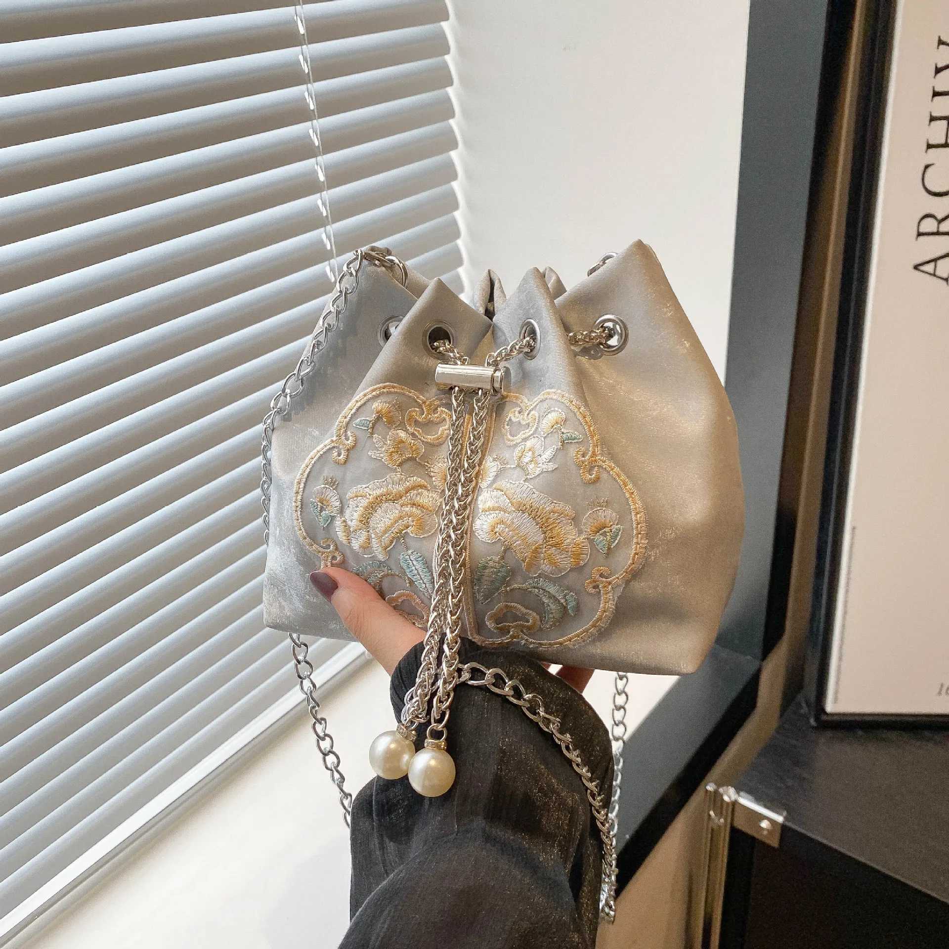 Chinese style womens handbag 2025 new sturdy and beautiful chain bag niche single shoulder cross bucket bagXJ250412