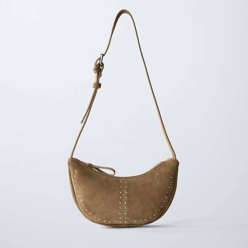 Women's 2025 Spring/Summer New Item Niche Design Rivet Decoration Daily Matching Casual Bag