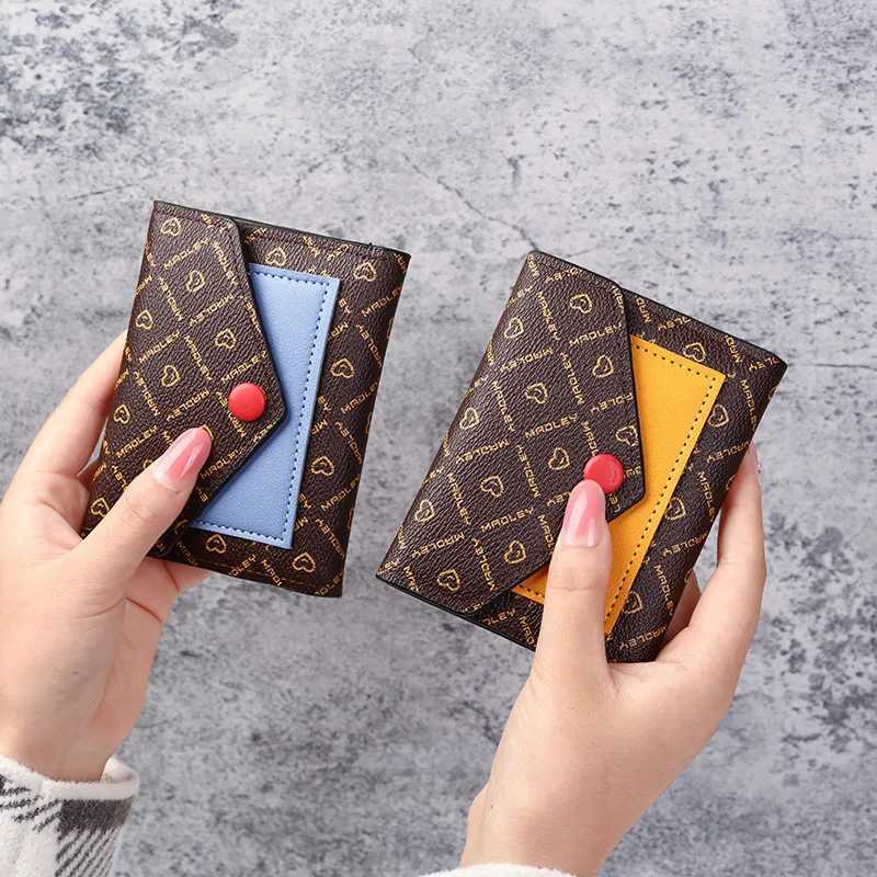 Leather small wallet womens design splicing short wallet womens short coin zipper wallet card holder Z250411