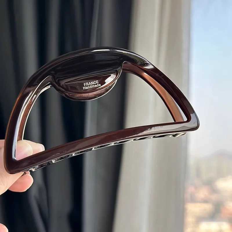 One European and American hair ornament hollow acetic acid handle big meat ball hair claw Y2504012
