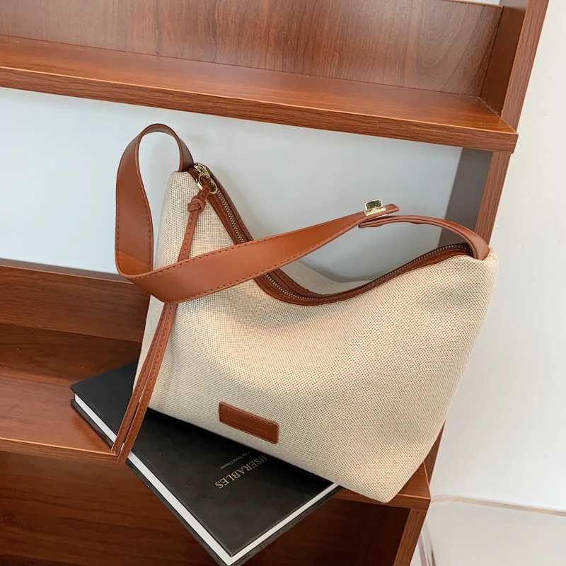 Fashionable and casual soft ordinary womens bag Oxford cloth shoulder foreskin leather shoulder strap handbag womens luxury bagXJ250412