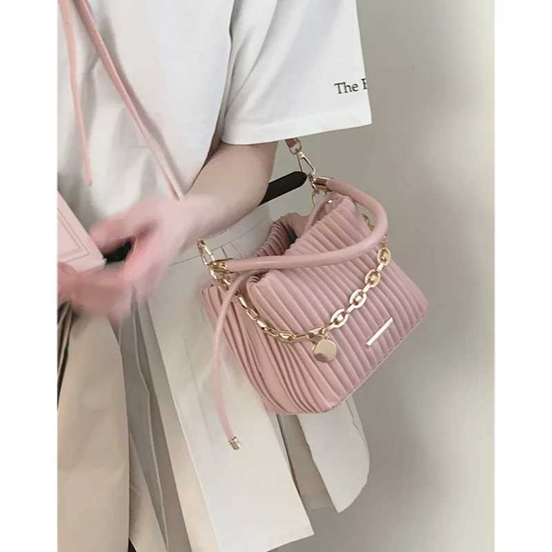 Sweet Fi wallet and handbag 2023 new pleated bucket elegant Korean Versi Fi casual cross body bagXJ250412
