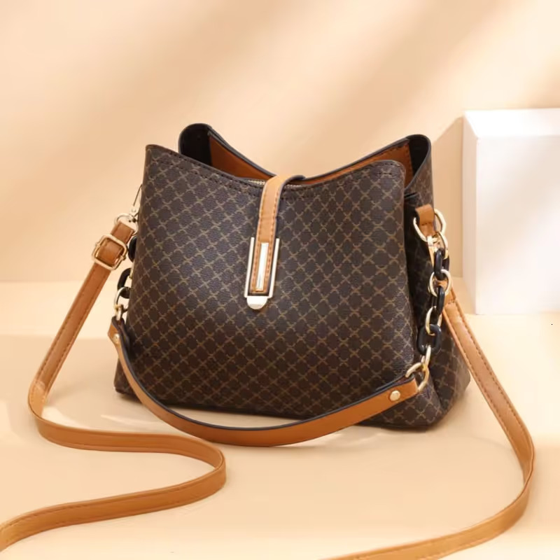 Quality New Leather Handbags High Capacity Advanced Sense Female Long Strap Shoulder Bag