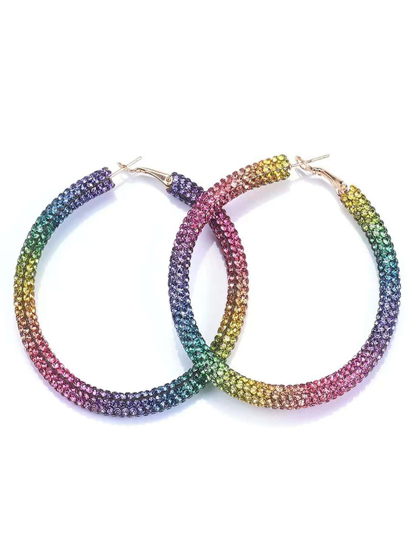 Ladies' earrings with rainbow colored rhinestones and large circular earrings