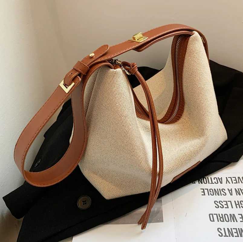 Fashionable and casual soft ordinary womens bag Oxford cloth shoulder foreskin leather shoulder strap handbag womens luxury bagXJ250412