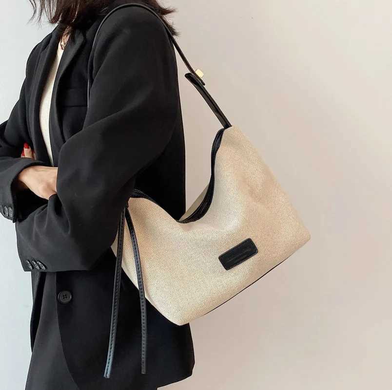 Fashionable and casual soft ordinary womens bag Oxford cloth shoulder foreskin leather shoulder strap handbag womens luxury bagXJ250412