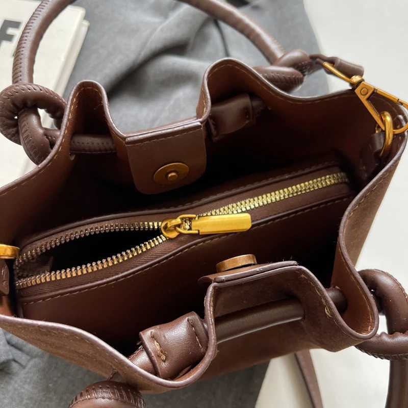 Frosted leather folding handheld bucket bag 2024 new fashionable Fi shoulder bag Versatile cross body bagXJ250412