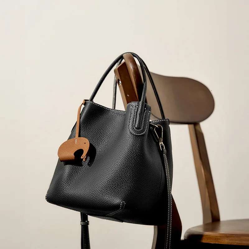 2024 Summer New Fashion Leather Bucket Niche First Layer Cowhide Retro Shoulder Oblique Span Portable Vegetable Basket Bag
