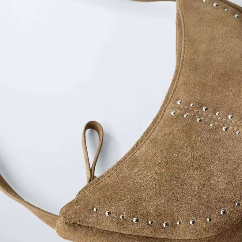 Women's 2025 Spring/Summer New Item Niche Design Rivet Decoration Daily Matching Casual Bag