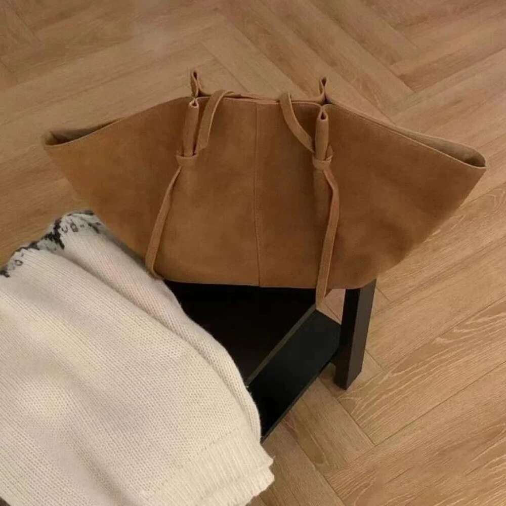 2024 Niche Design Wing Matte Cowhide Large Capacity Handheld Tote Suede Autumn And Winter Women's Shoulder Bag