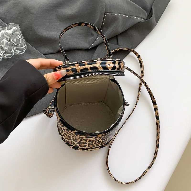 Retro womens bag 2024 leopard PU leather cross body mini womens zipper round bucket handbag wallet messenger bagXJ250412