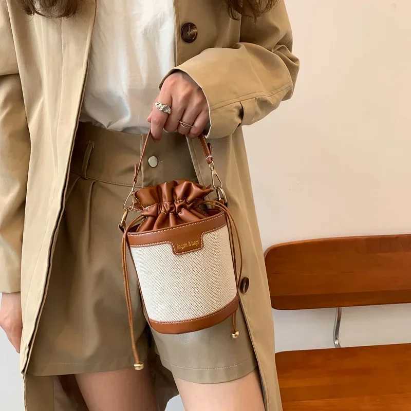 Womens shoulder bag cylindrical PU leather bucket womens cross body bag casual Drstring handbag summer travel shoppingXJ250412