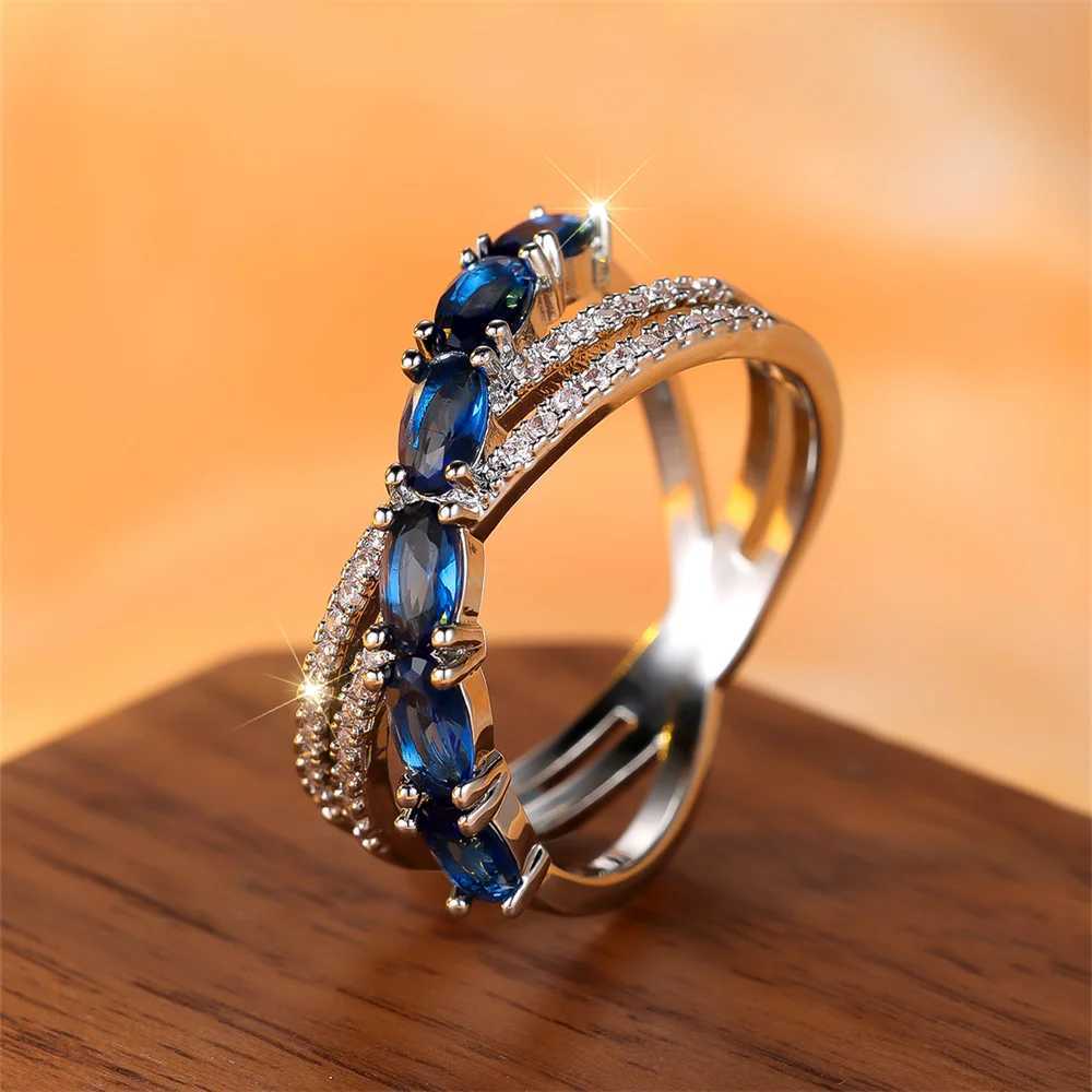 Blue crystal oval stone cross ring suitable for women Tren silver wedding band engagement jewelry simple and fashionable birthday giftXJ250412