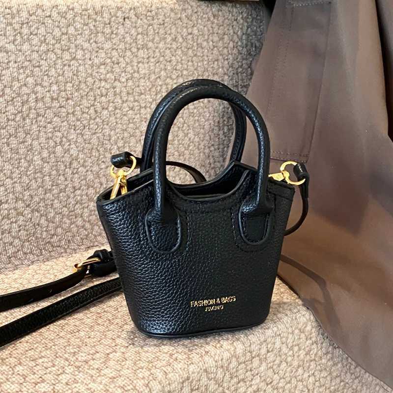 FI Super Mini Cross shaped Bag Cute Womens Lipstick Bag Solid Color Pu Leather Bag Coin Wallet Earplug Bag Mini Bucket HandbagXJ250412
